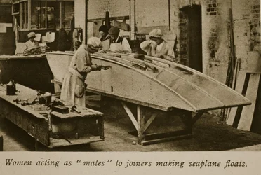 Women acting as mates to joiners making seaplane floats